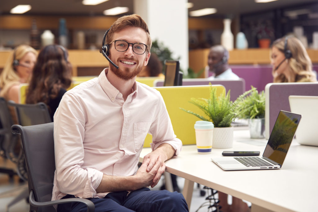 Businessman Wearing Headset Talking